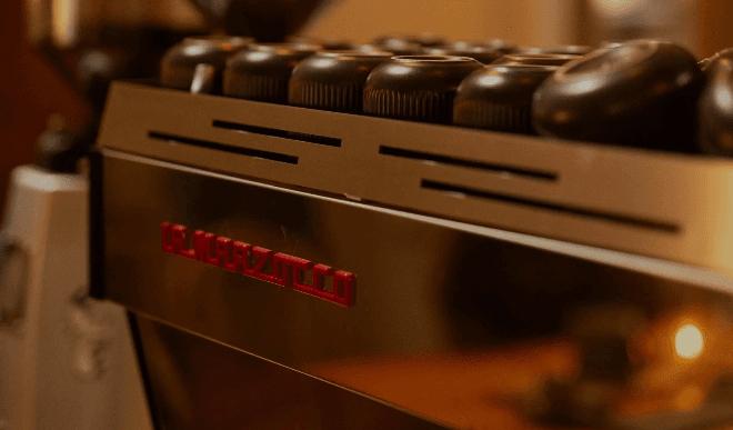 A La Marzocco espresso machine at Cherry Bomb Cafe brewing Kindred Coffee